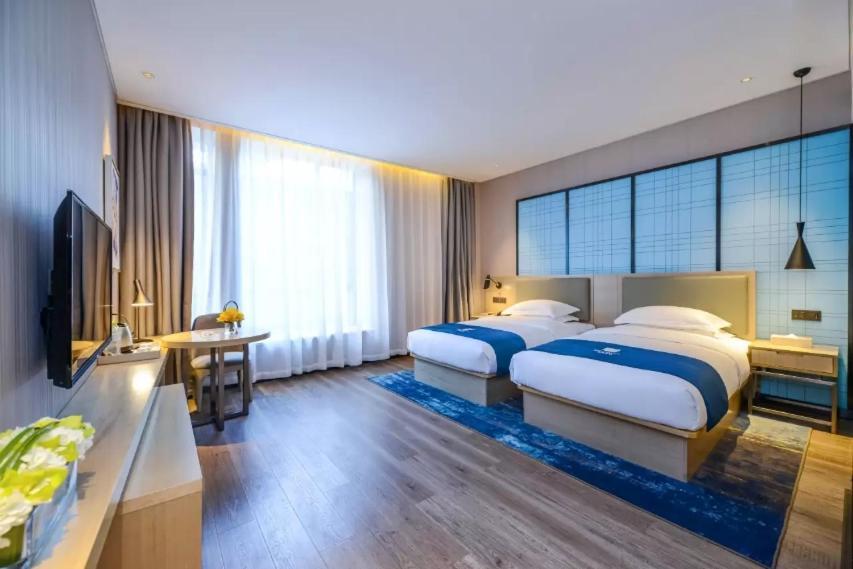 Echarm Hotel Ji'Nan Railway Station Jinan Eksteriør billede